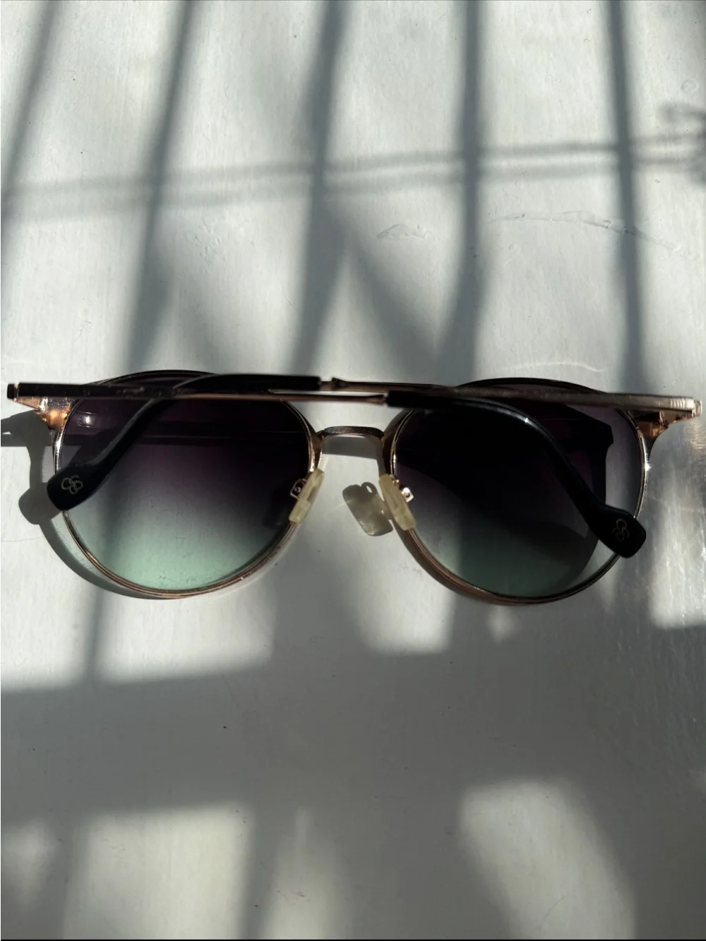 Gold and black sunglasses - a little scratched but not noticeable when worn